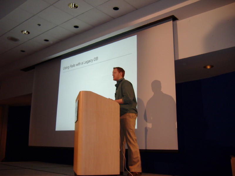 Robby Russell speaking on stage at Canada on Rails in Vancouver, April 2006